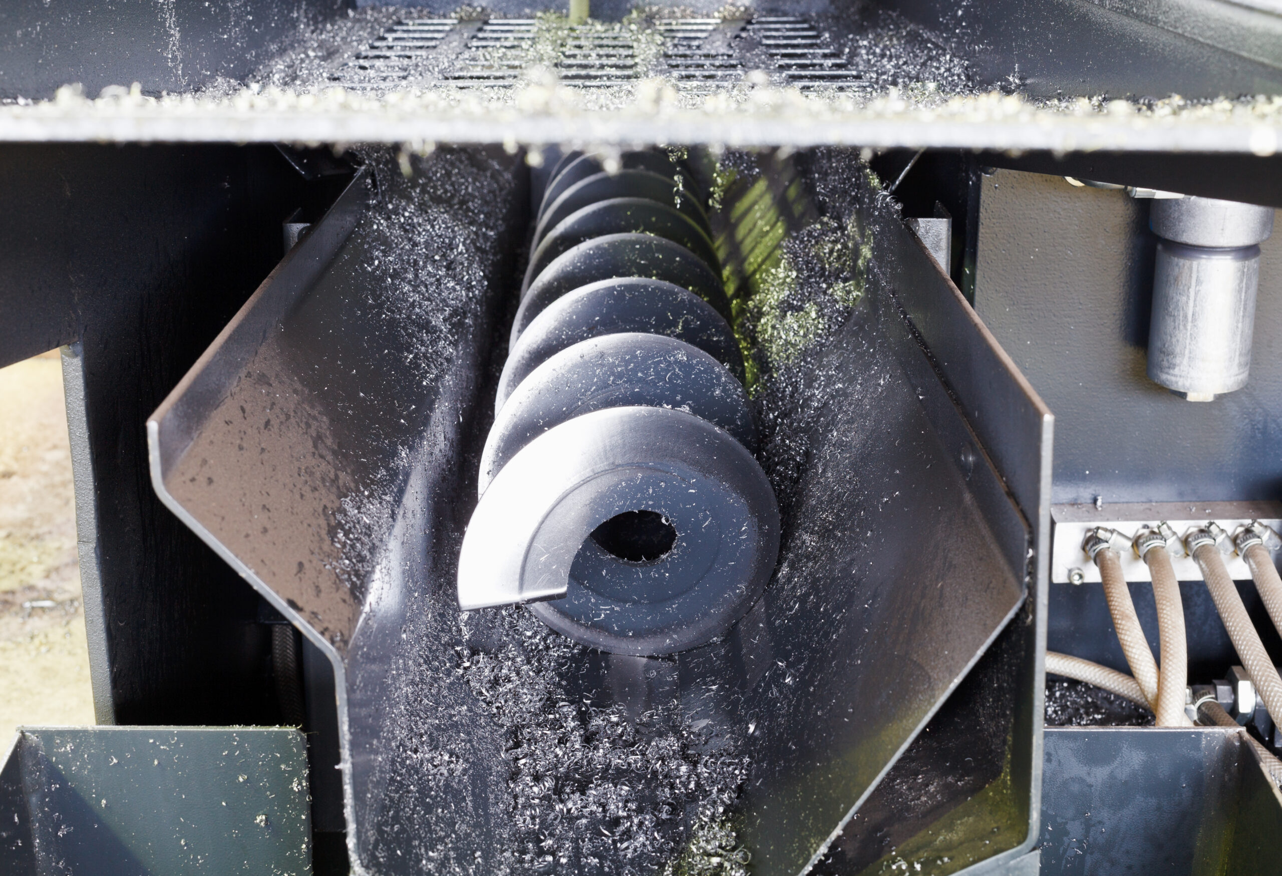 screw and metal chip from lathe machine