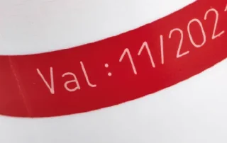laser-marking-on-hdpe-plastic-bottle-close-up